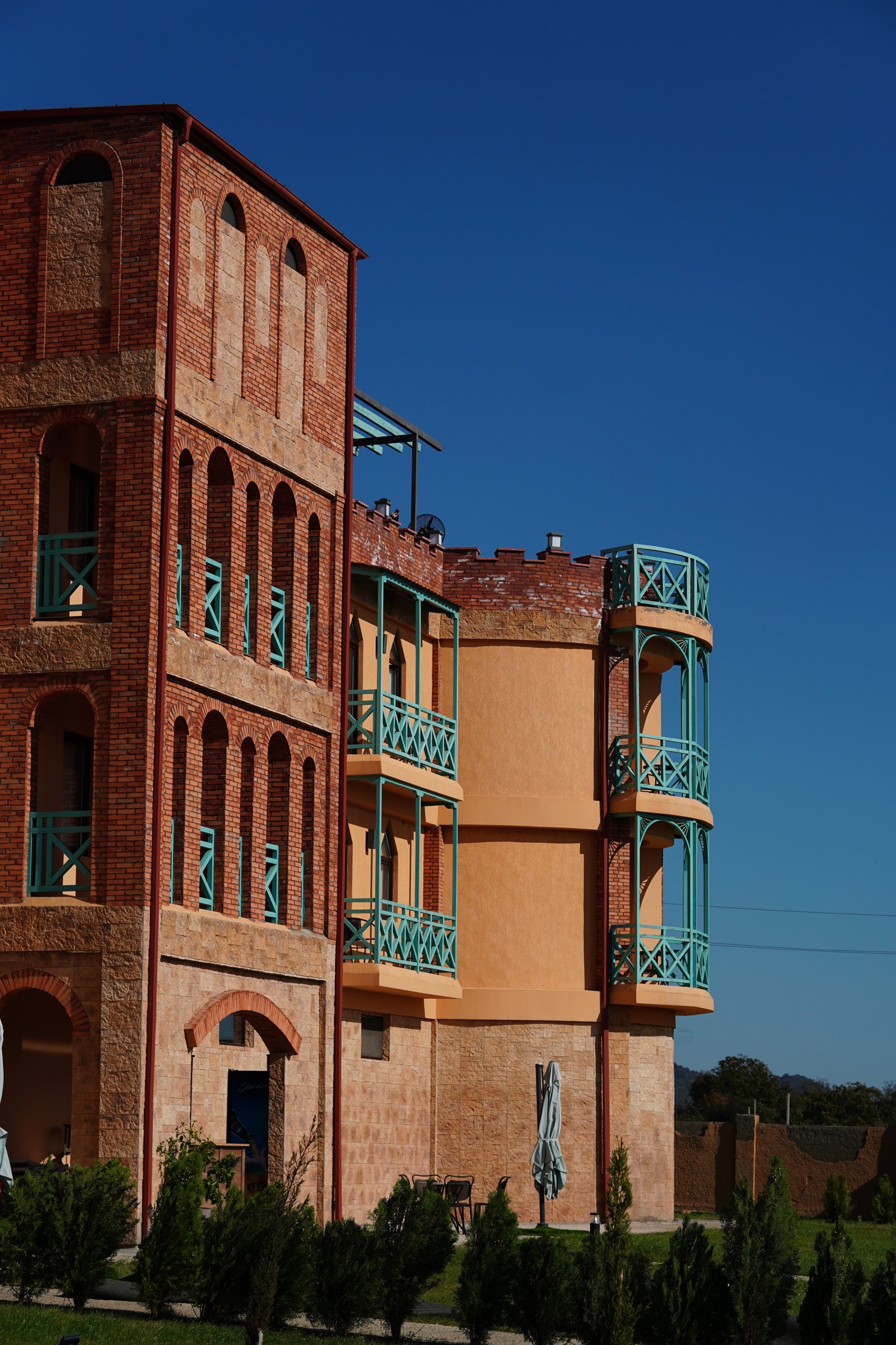 Burki Castle facade against a clear October sky