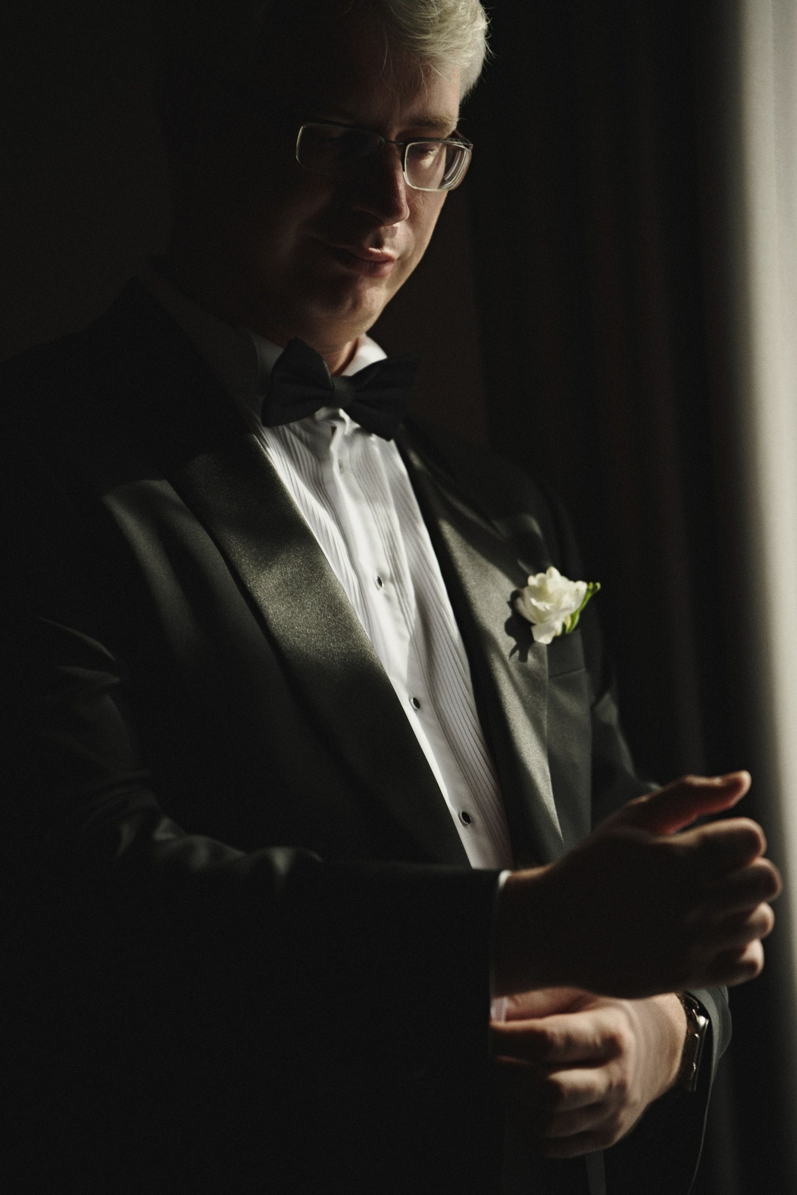 The groom by the window light