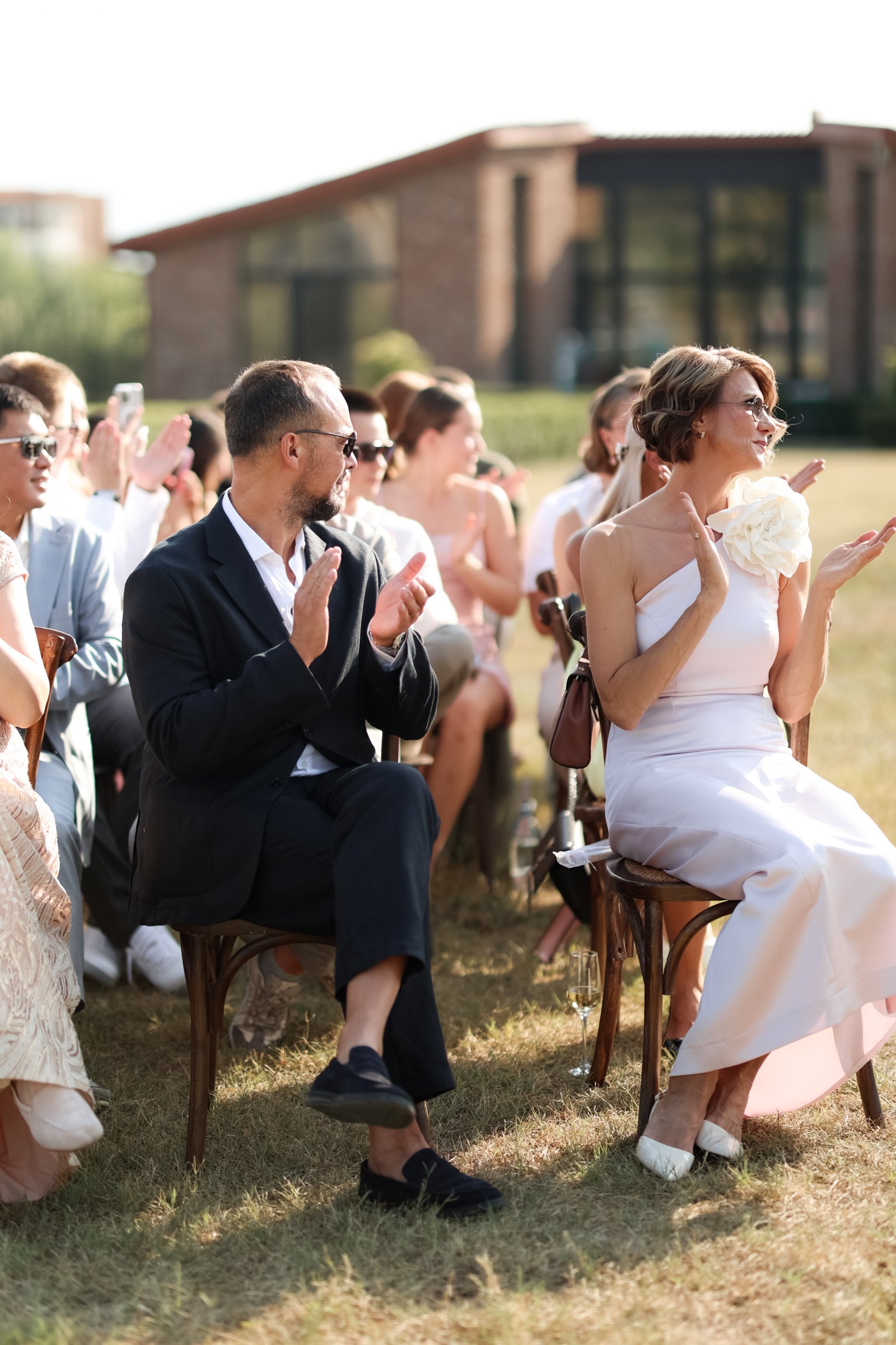 Past the guests, moments before the vows