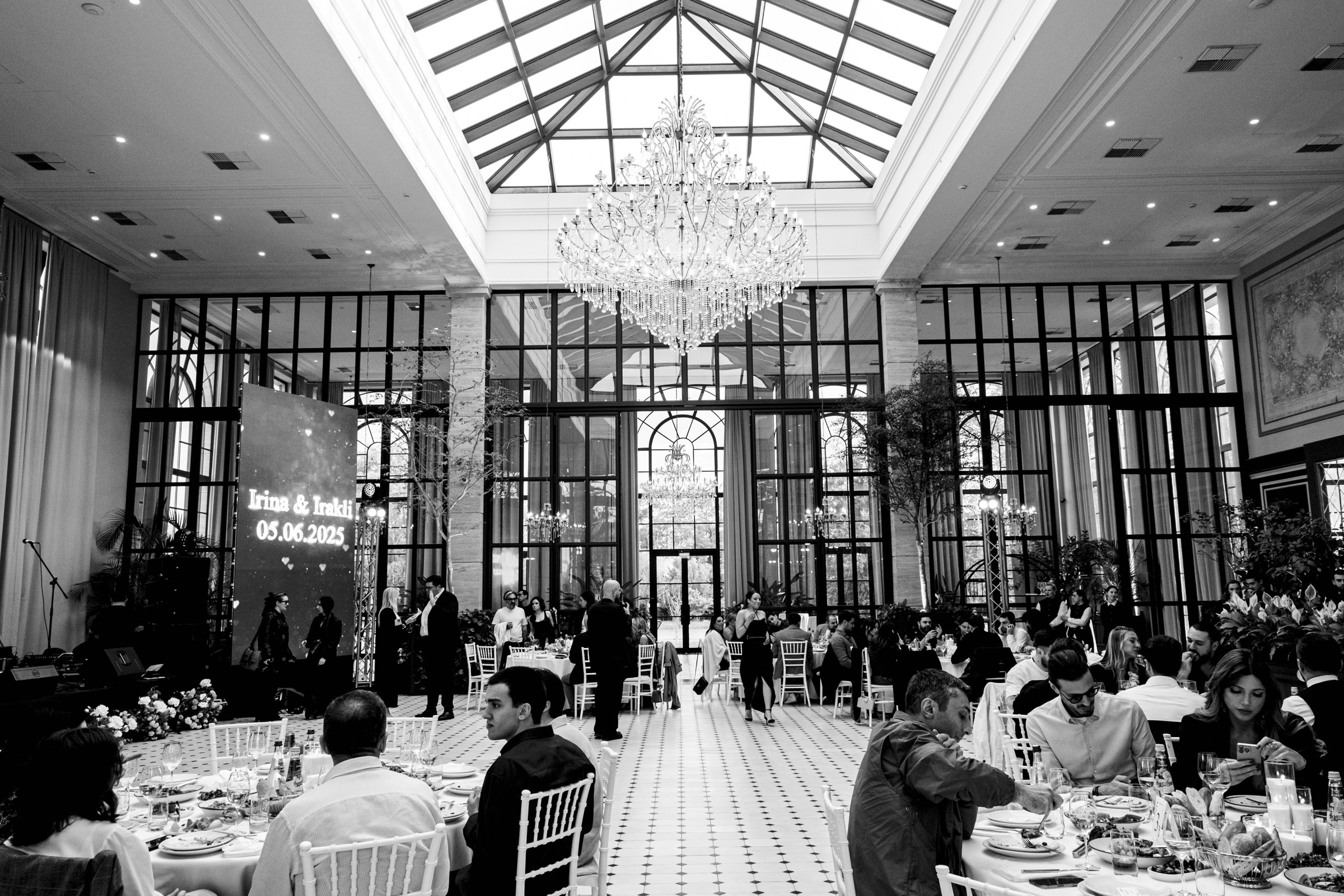 Dinner under the glass roof, black and white