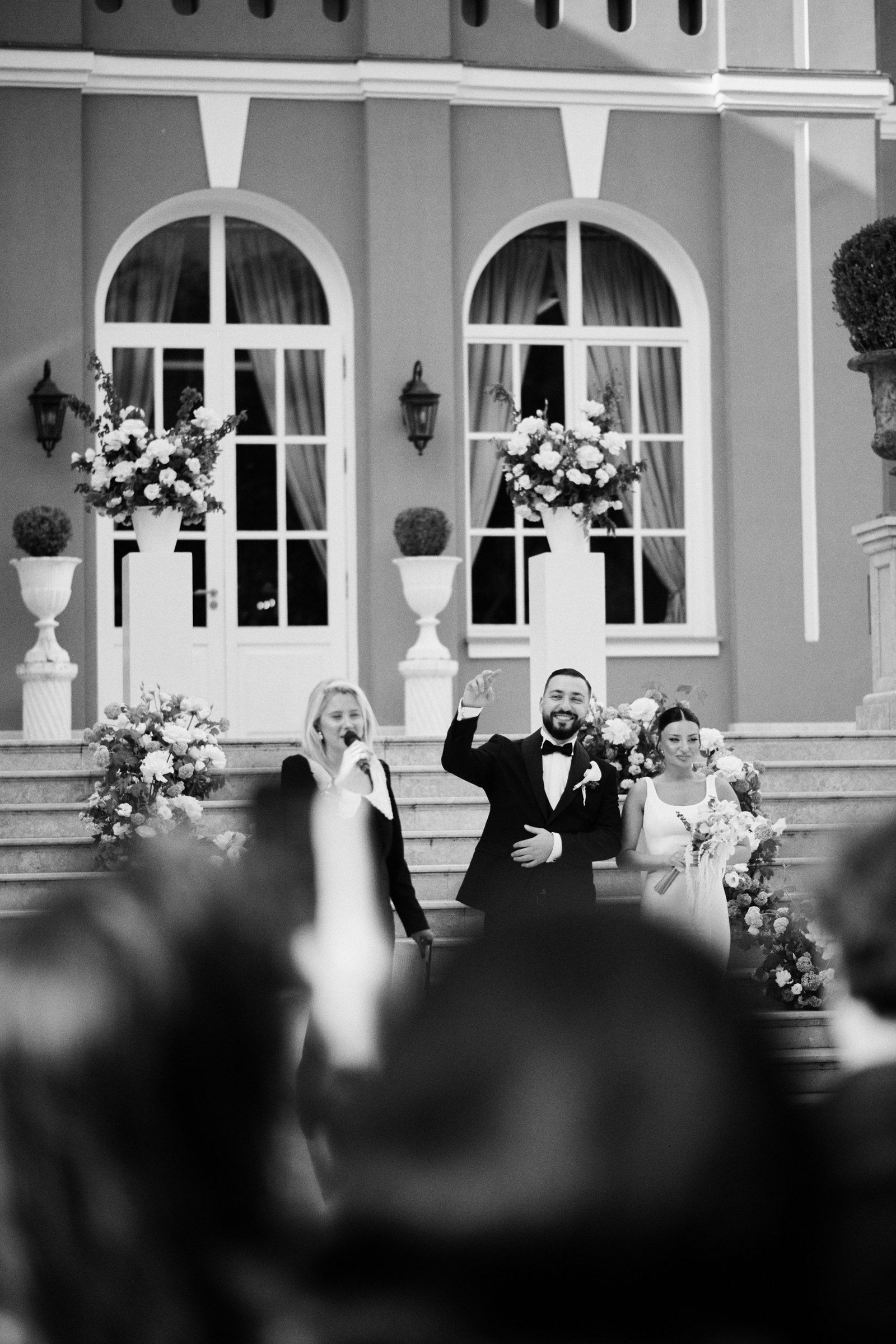 The recessional through cheering guests, black and white