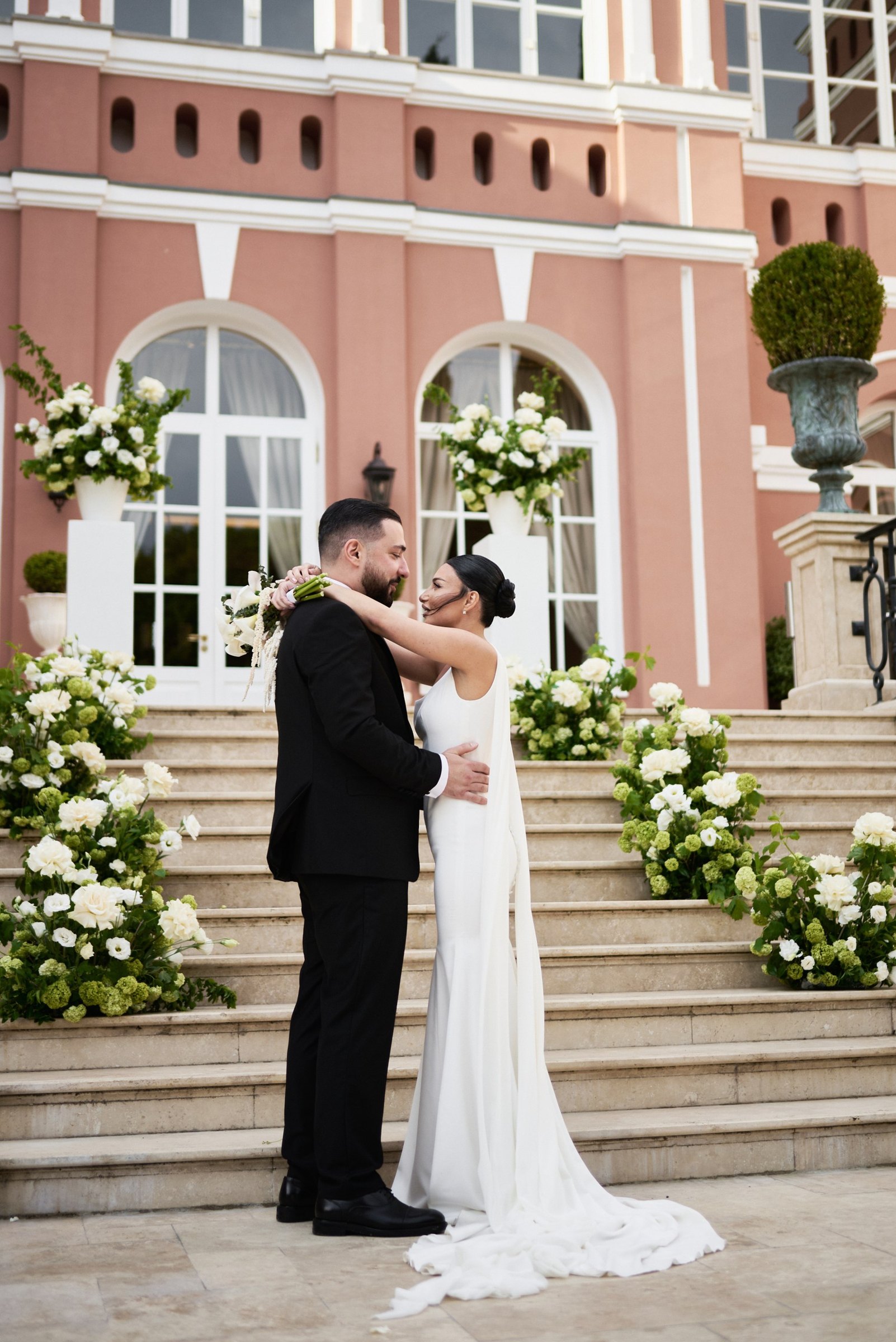 Vows framed by the palace steps