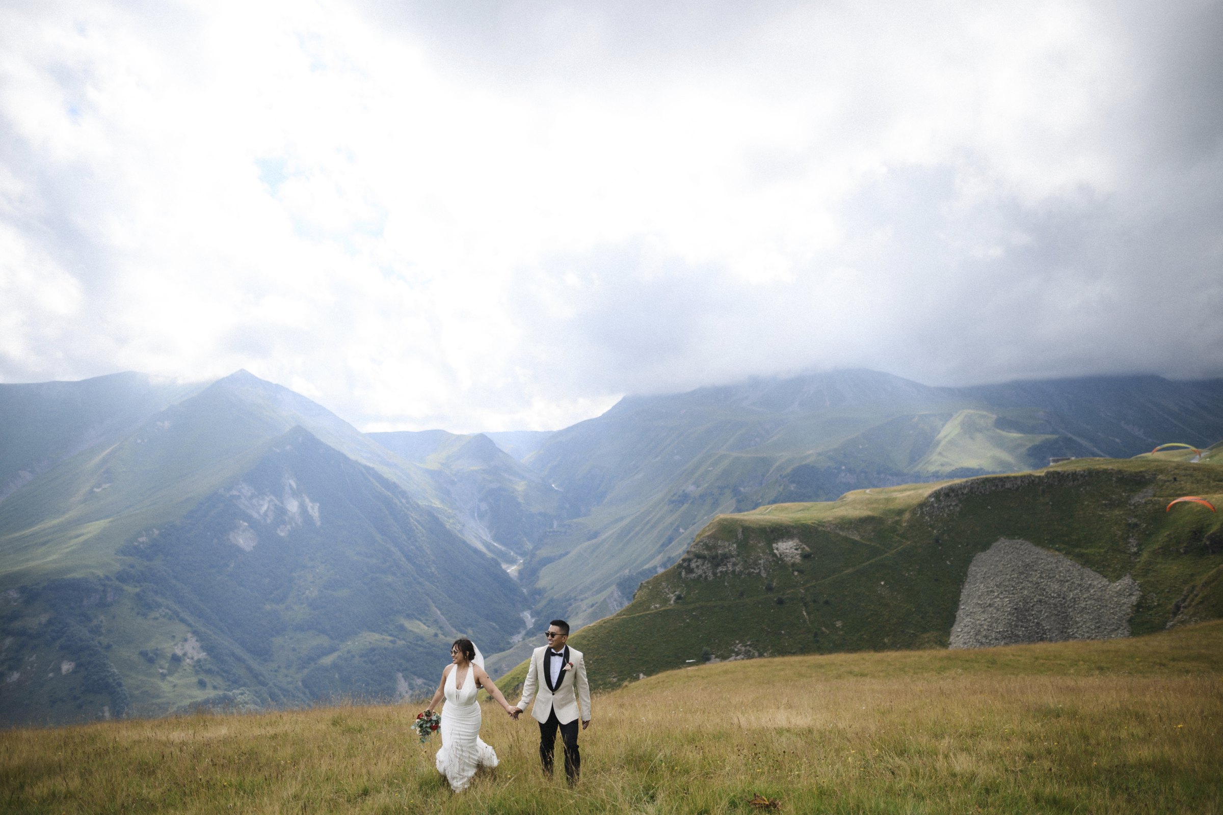 The couple walks the high valley alone