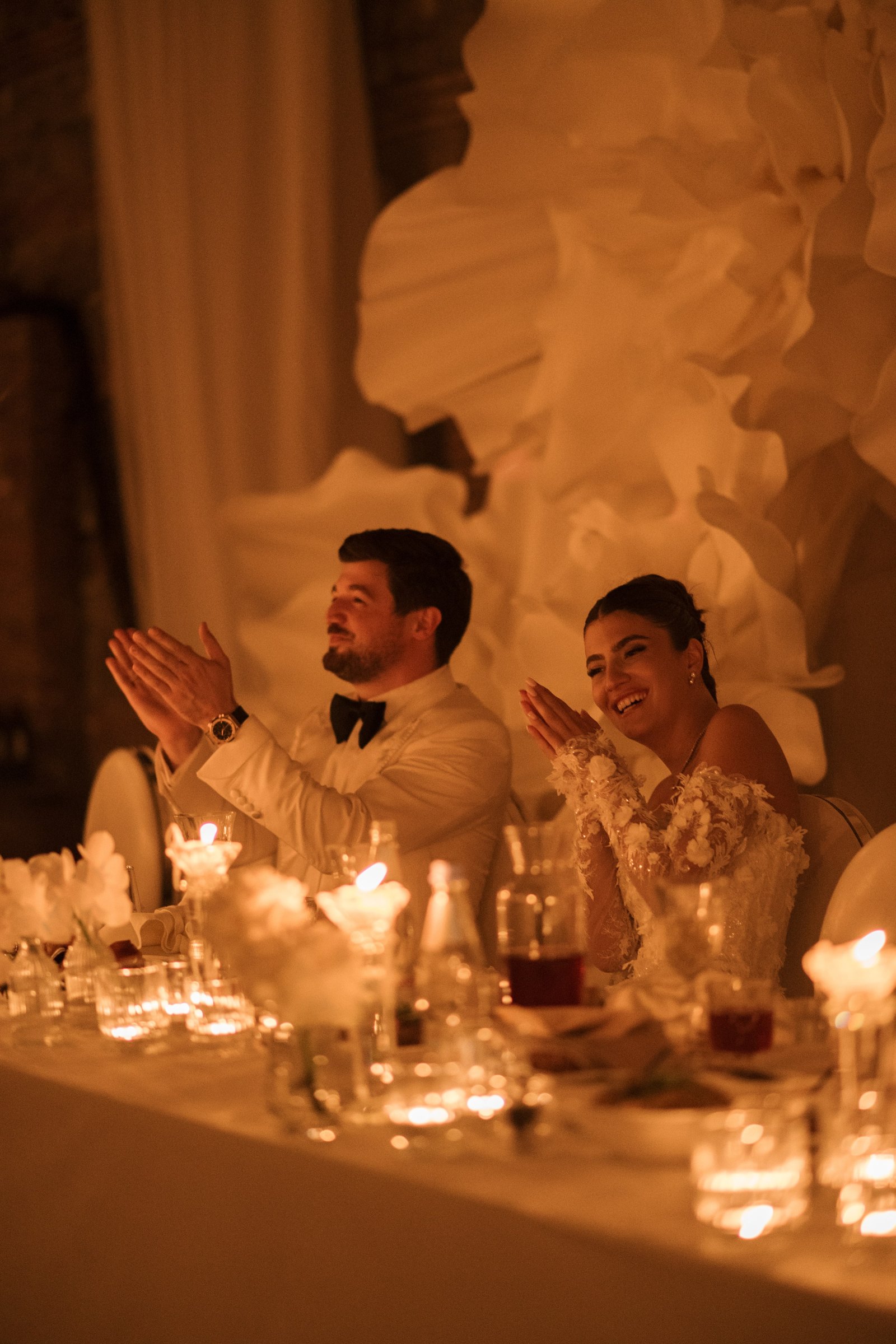 Candlelight over the sweetheart table