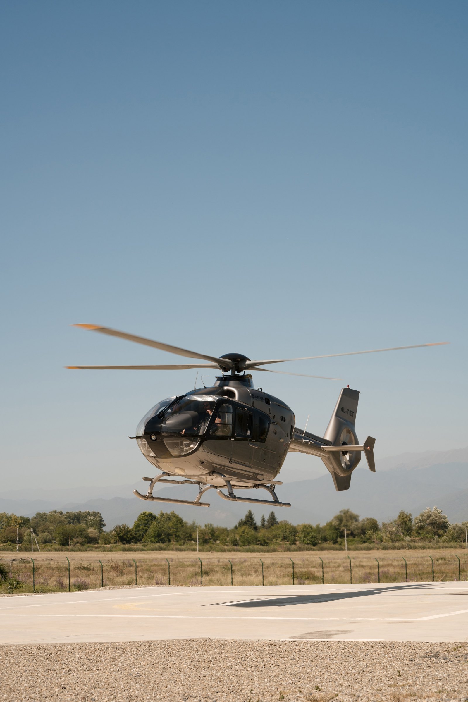 The helicopter sets down at the estate