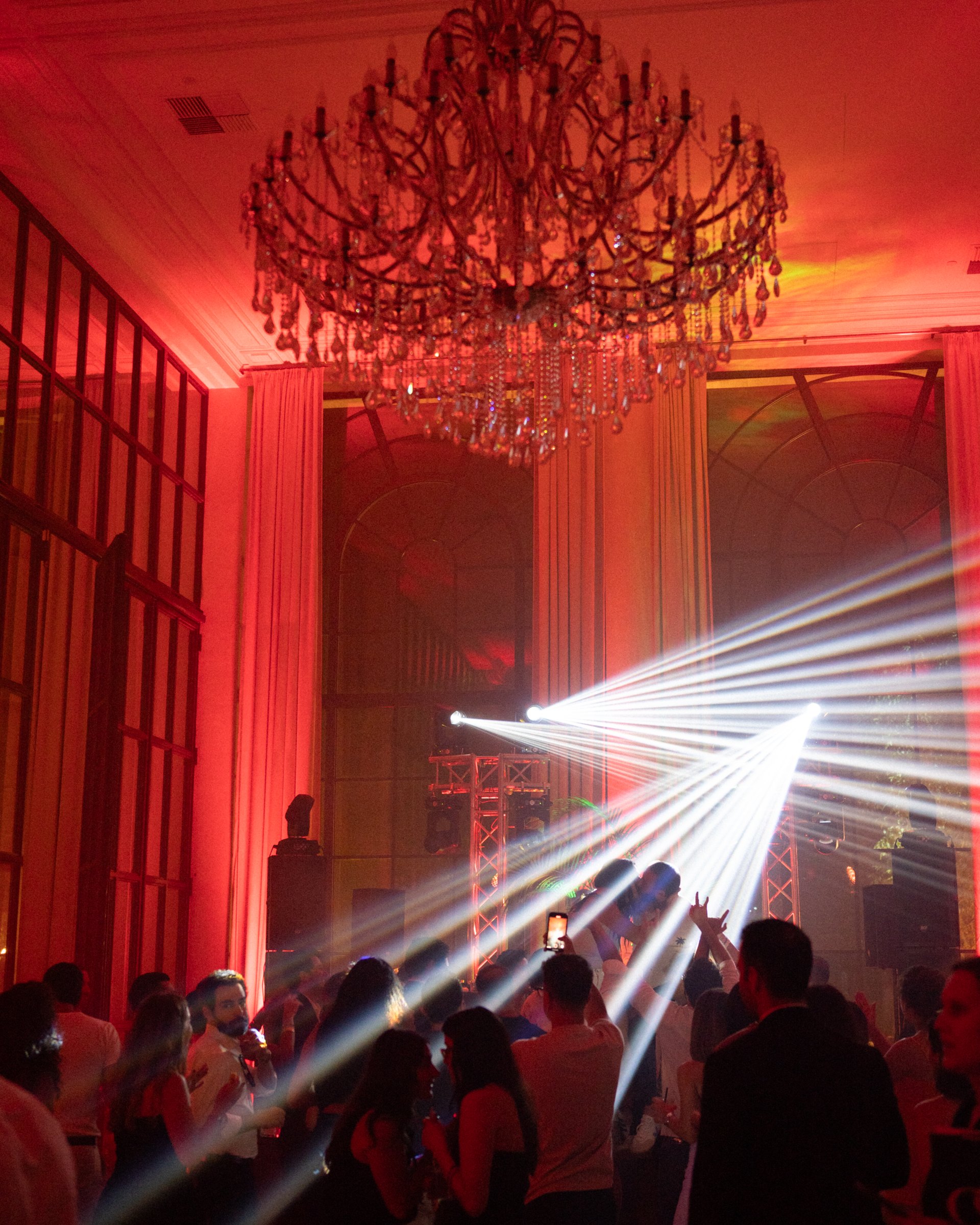 The chandelier hall switched to red for the party