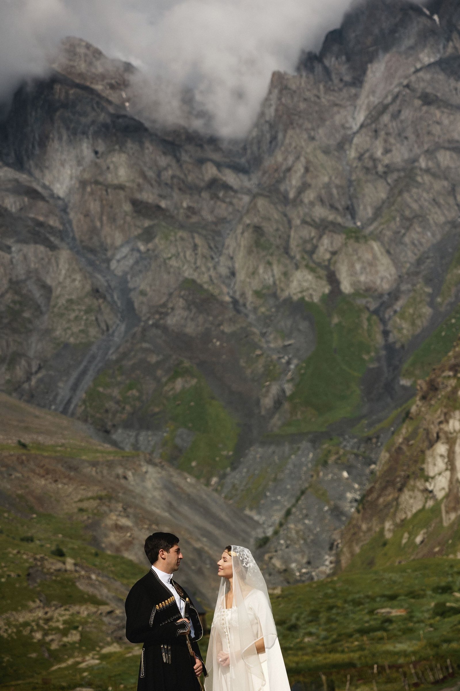Two figures in the mountains