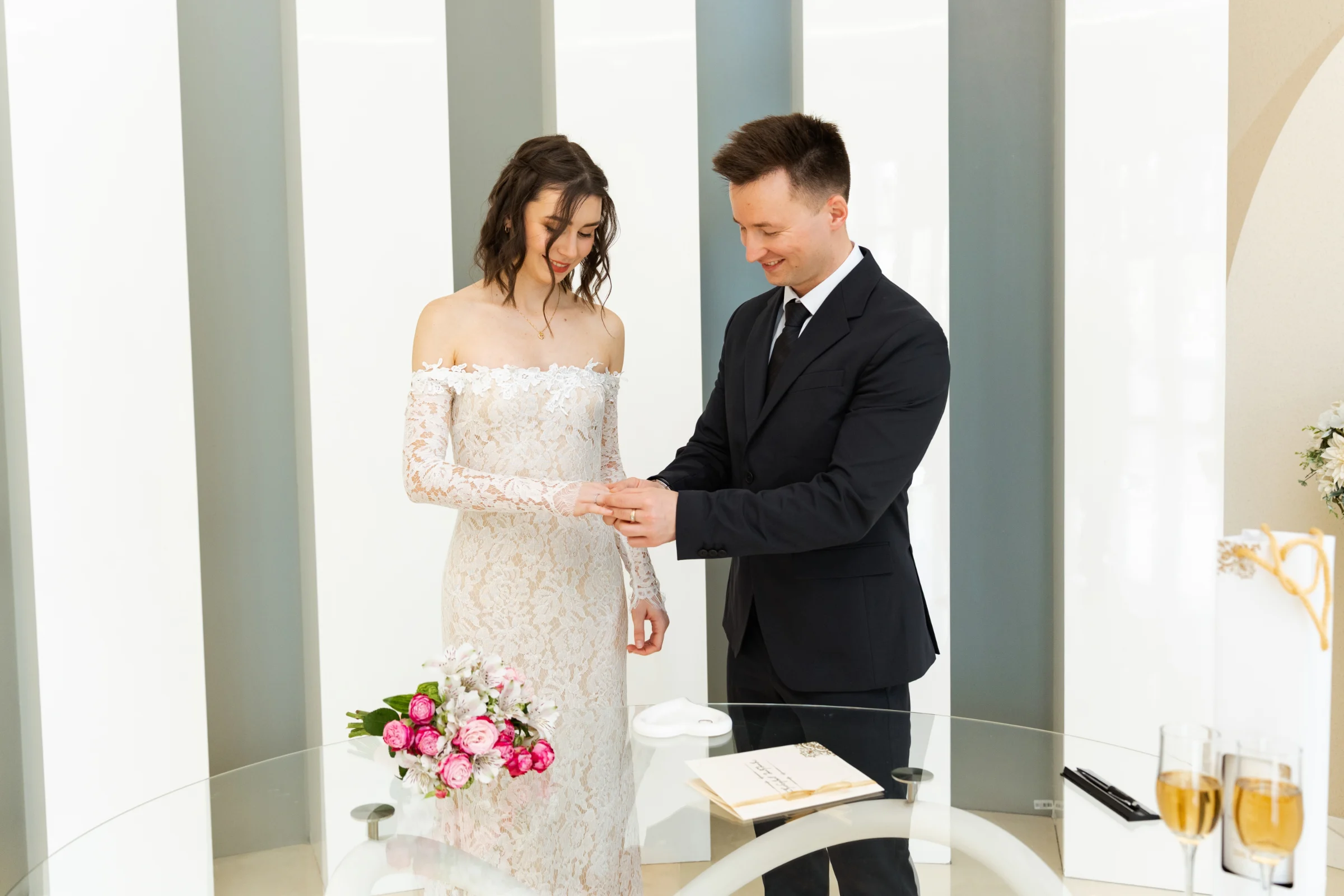 Rings at the register office, the certificate and champagne on the table