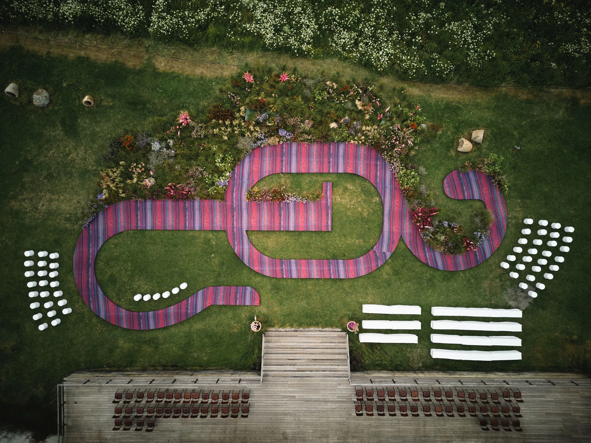 The ceremony carpet monogram and its flower beds, seen from above